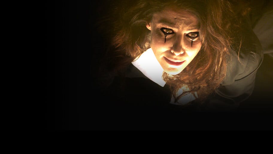 The Most Assassinated Woman in the World backdrop