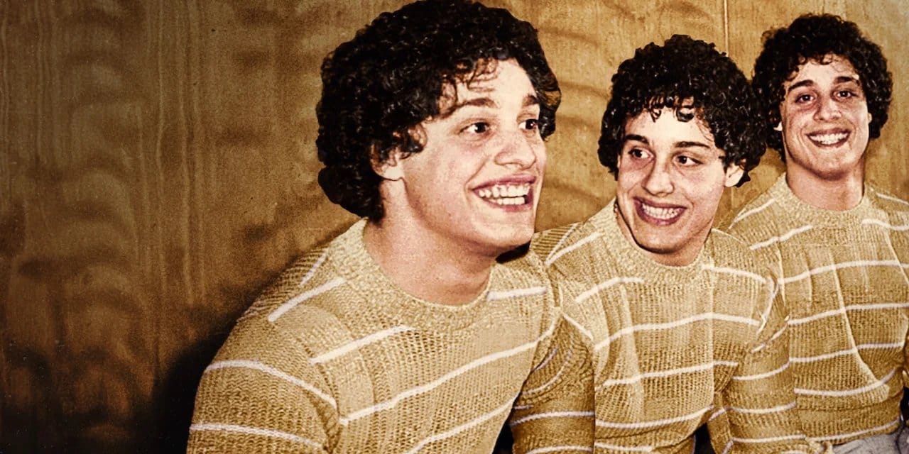 Three Identical Strangers backdrop