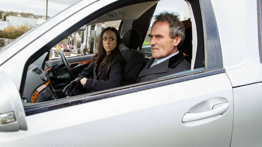 The Funeral Director backdrop