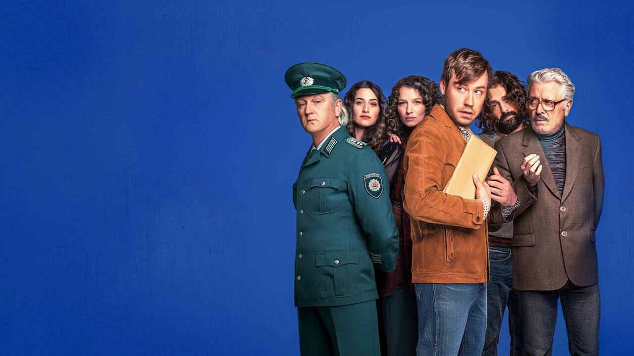 A Stasi Comedy backdrop