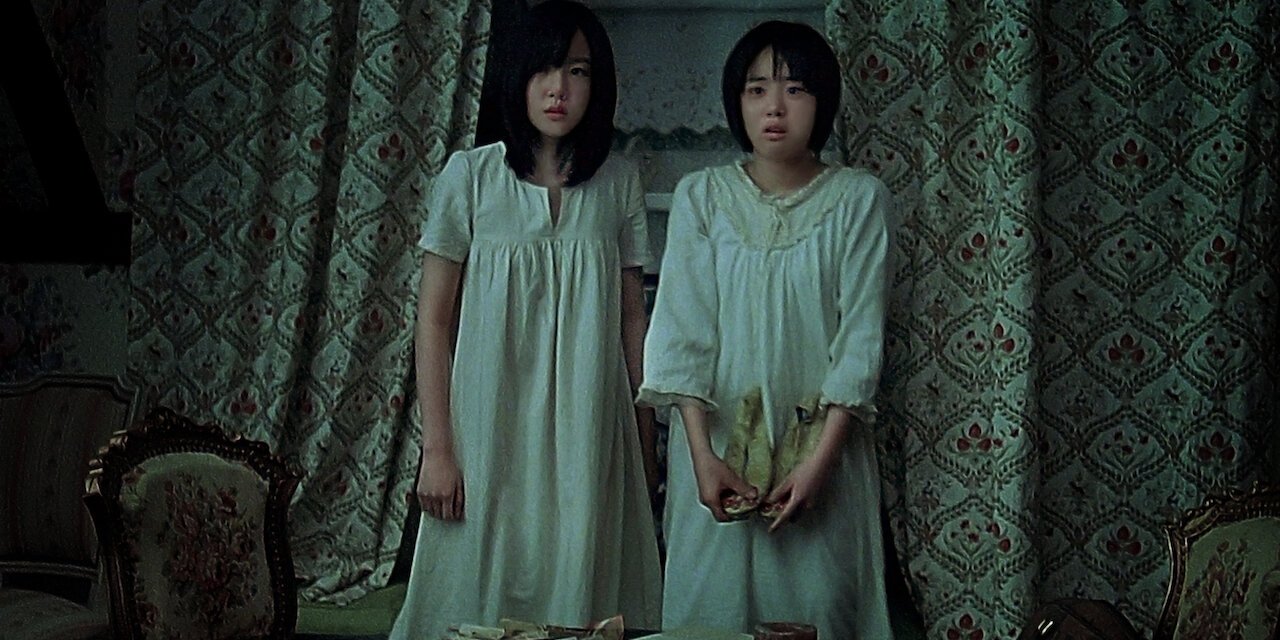 A Tale of Two Sisters backdrop